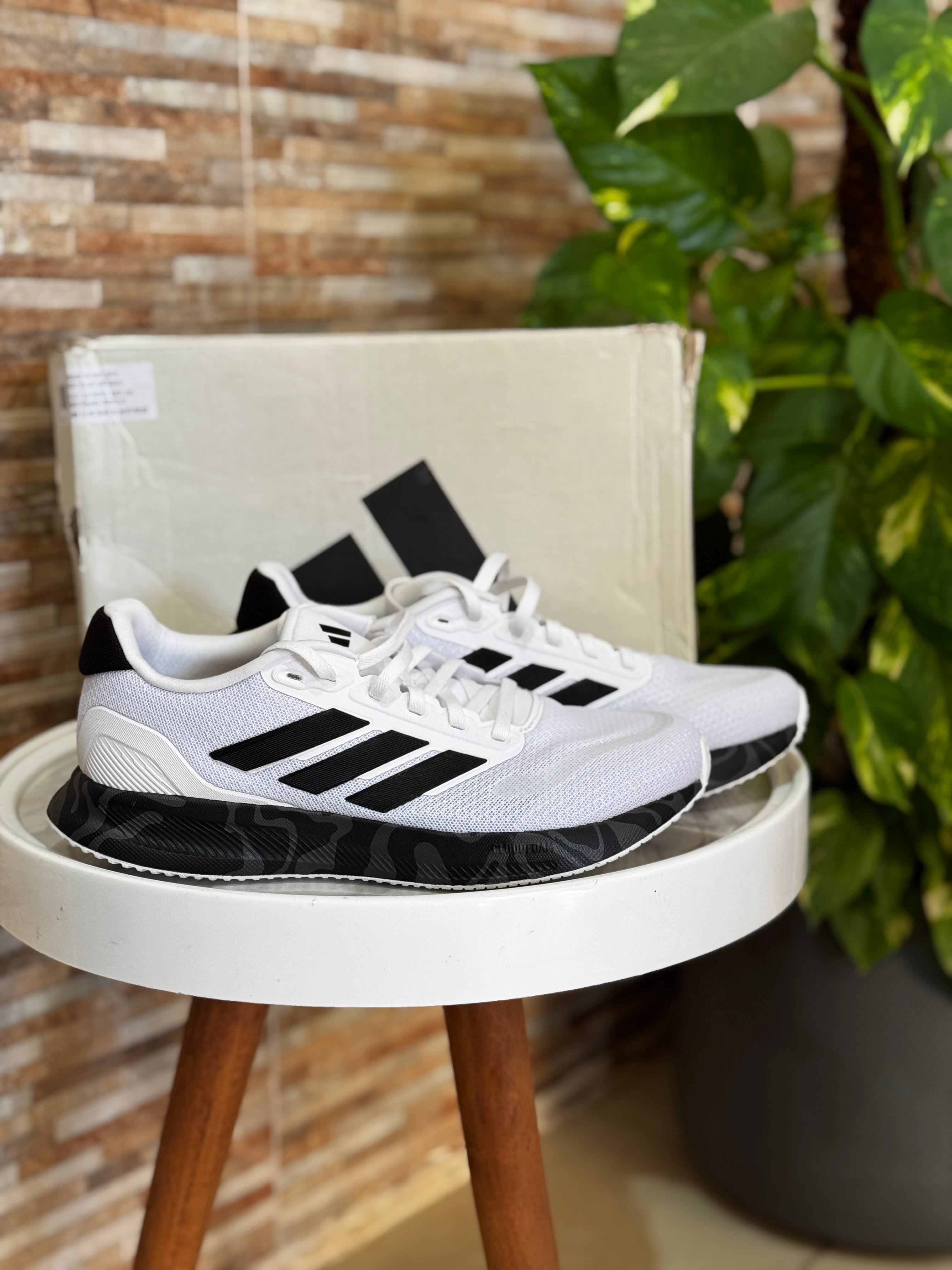 Original white and black Adidas Runfalcon 5 running shoes.