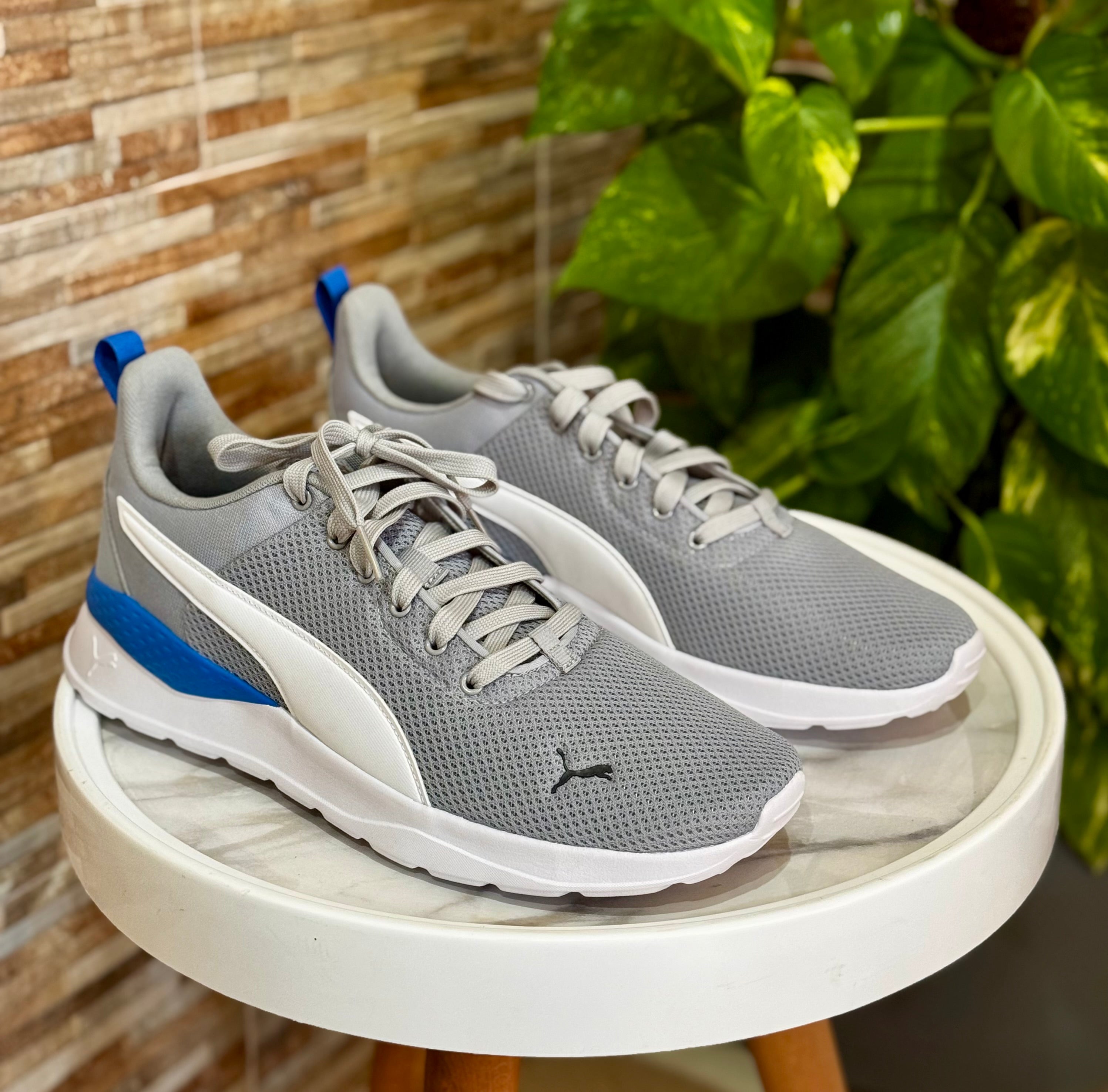 Anzarun Lite sneakers in Ash Grey, Regal Blue, and Puma White.