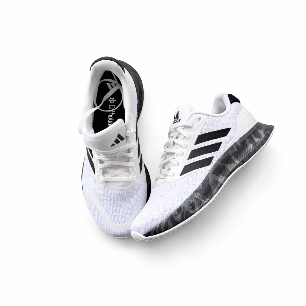 Original white and black Adidas Runfalcon 5 running shoes.