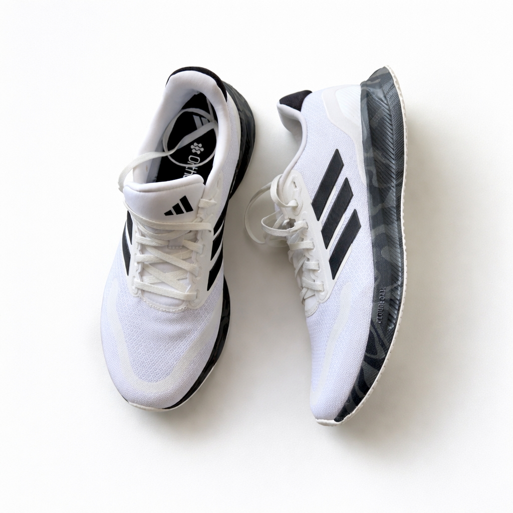 Original white and black Adidas Runfalcon 5 running shoes.